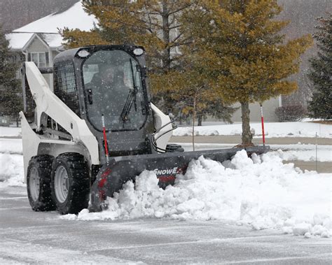 plowing snow with a skid steer|snowex plows for skid steers.